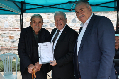 Bursa Ürünlü'de 275 hak sahibine imarlı tapu sevinci